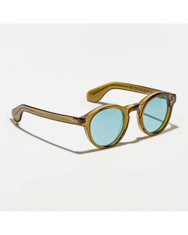Las Keppe sun en Olive Brown con lentes minerales azules vista 3q