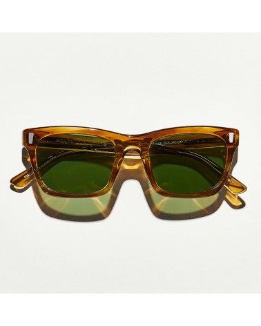 The Yona Sun in honey Blonde with Calibar green glass lenses
